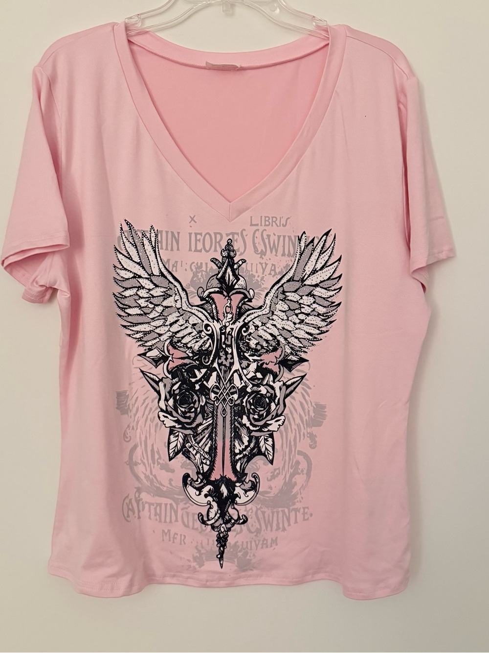 Free Kisses Pink V-Neck Graphic Tee with Winged Sword and Roses